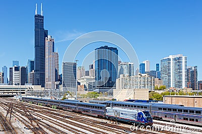 Skyline with Amtrak Midwest passenger train railway near Union Station in Chicago, United States Editorial Stock Photo