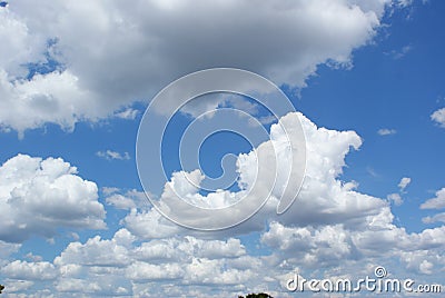 A Skyline with Blue Sky and White and Gray Clouds Stock Photo