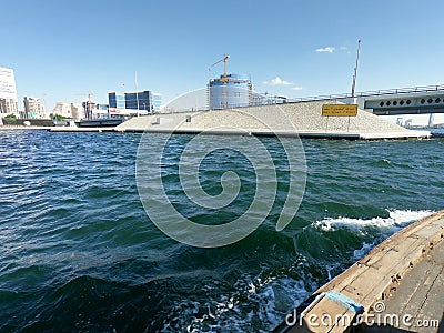 Skyline and Bridge View of Dubai Creek - View of Buildings and water in Day Time Located in Gulf of Dubai Editorial Stock Photo