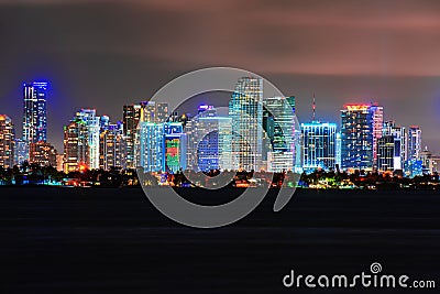 Skyline city miami lighting lights sea ocean sunset night cityscape buildings downtown, architecture skyscraper dusk Editorial Stock Photo