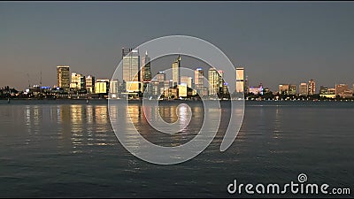 Skyline of the city of perth and the swan river in western australia at dusk Stock Photo