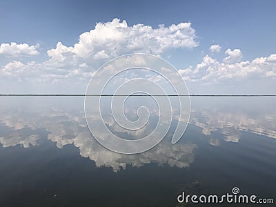 Skyline with Clouds and Water Stock Photo