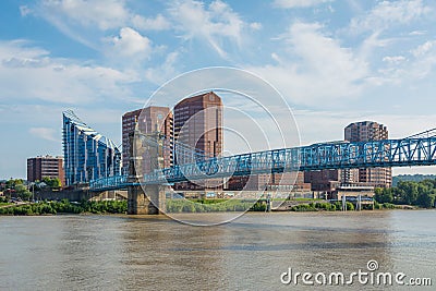 The skyline of Covington and John A. Roebling Suspension Bridge, in Cincinnati, Ohio Editorial Stock Photo