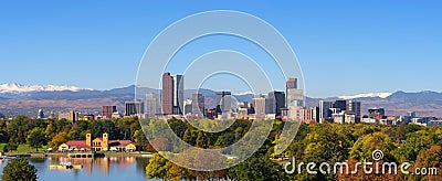 Skyline of Denver downtown with Rocky Mountains Stock Photo