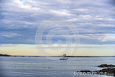 Skyline lighthouse with stormy sky on the Atlantic coast Stock Photo