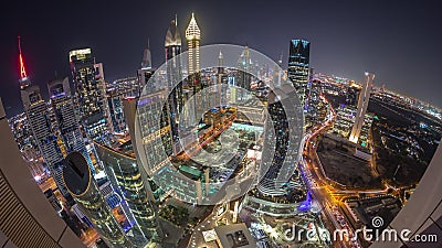 Skyline panorama of the high-rise buildings on Sheikh Zayed Road in Dubai aerial night timelapse, UAE. Editorial Stock Photo