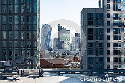 Rooftops and Modern Skyscrapers in Chelsea New York City Stock Photo