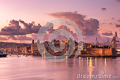 Skyline of Senglea at sunrise,Malta. One of Three Cities in Grand Harbour Stock Photo