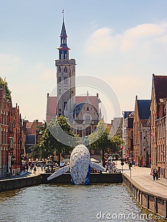 Skyscraper, the Bruges Whale, plastic statue by StudioKCA in downtown Bruges , part of Bruges triennial 2018 Editorial Stock Photo