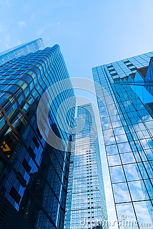 Skyscraper building architecture. Skyscraper with glass. Modern glass building. Skyscraper in metropolis city. City Stock Photo