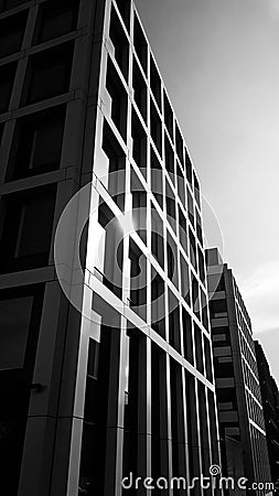 Skyscraper vertical in black and white Monochrome photograph Futuristic view of the dark urban world to come Stock Photo
