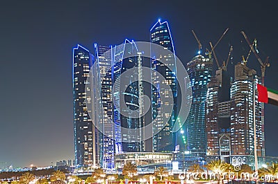 Skyscrapers in Abu Dhabi at night Stock Photo