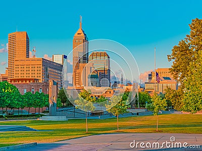 Dusk lights hits the Indianapolis skyline in the White River State Park, Indiana Stock Photo