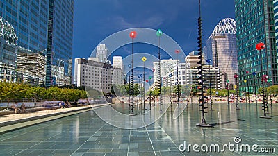 Skyscrapers of La Defense timelapse - Modern business and residential area, the fountain of the Esplanade. Paris, France Stock Photo