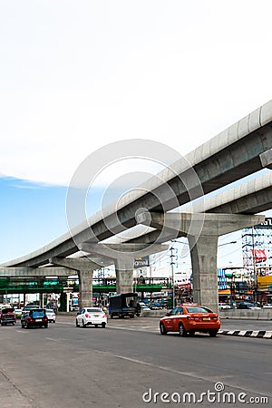 Skytrain elevated rails over main road Editorial Stock Photo