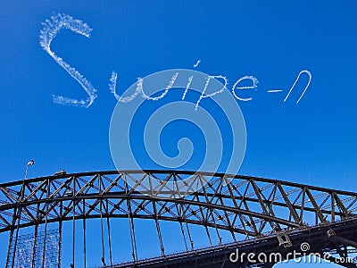 Skywriting Over Sydney harbour Bridge, Australia Editorial Stock Photo