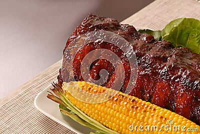Slab of barbeque ribs and corn Stock Photo