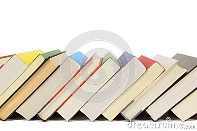 Slanted row of books, leaning, isolated on white background, copy space Stock Photo