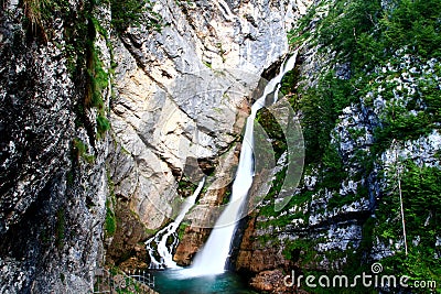 Slap Savica waterfall in Slovenia flows over mossy cliffs Stock Photo