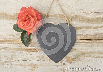 Slate heart with a rose Stock Photo