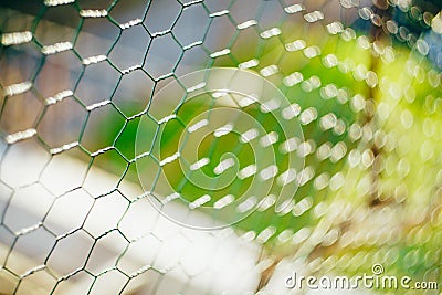 The slave`s net. Green mesh slave on a green background Stock Photo