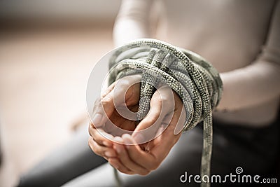 Slavery Victim And Hostage Tied By Rope Stock Photo