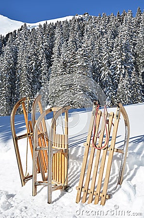 Sledges against snowy Alps Stock Photo