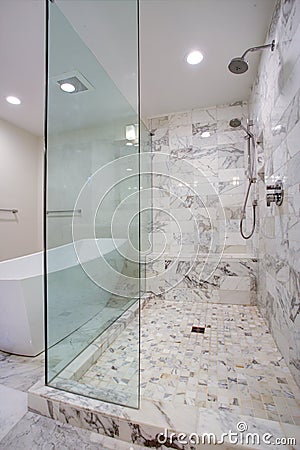 Sleek bathroom with large walk in shower Stock Photo