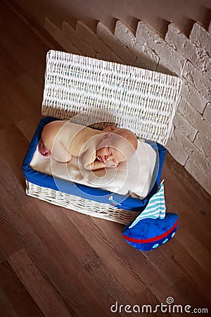 Sleeper newborn baby in white box Stock Photo