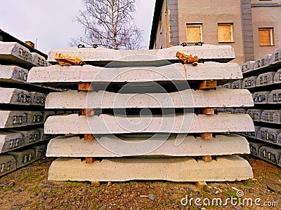 Sleepers production. Concrete casting and assembly. New concrete railway ties stored Stock Photo