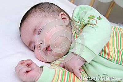 Sleeping baby girl Stock Photo