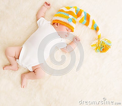 Sleeping Baby, Newborn Kid Sleep In Hat, Beautiful New Born Infant Child Stock Photo