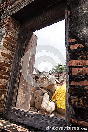 Sleeping Buddha and frame from window Stock Photo