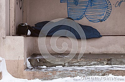 Sleeping homeless on the bus station Stock Photo