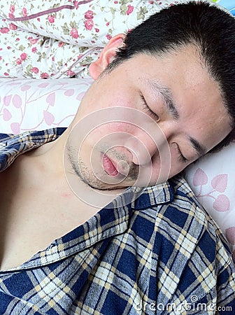 Sleeping man Stock Photo