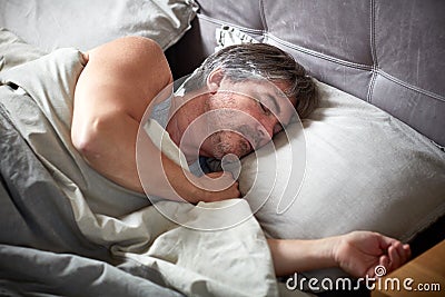 Sleeping man Stock Photo