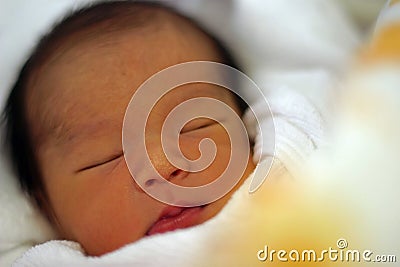 Sleeping newborn baby Stock Photo