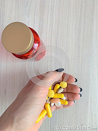 Sleeping pills in a female hand Stock Photo