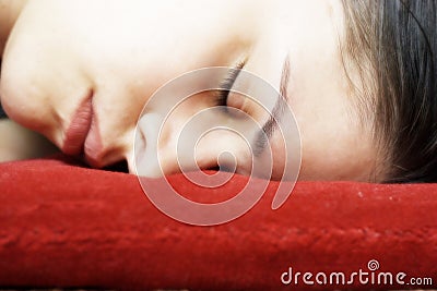 Sleeping woman face down Stock Photo