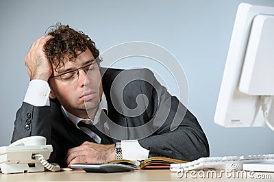 Sleeping young businessman Stock Photo