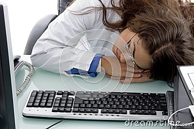 Sleeping young doctor Stock Photo