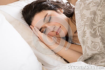 Sleeping young woman Stock Photo