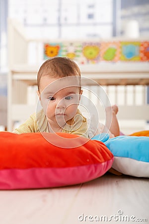 Sleepy baby on playmat Stock Photo