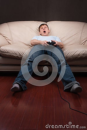 Sleepy gamer Stock Photo