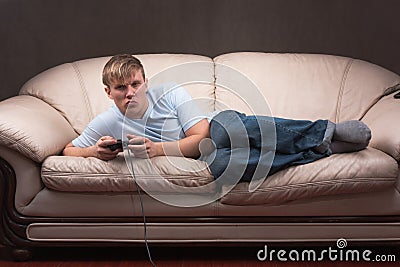 Sleepy gamer Stock Photo