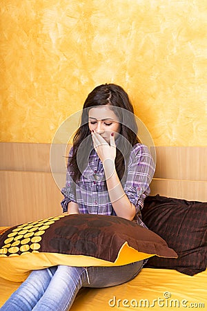 Sleepy girl holdin a pillow Stock Photo