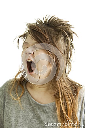 Sleepy girl yawning Stock Photo