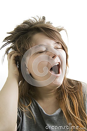 Sleepy girl yawning Stock Photo