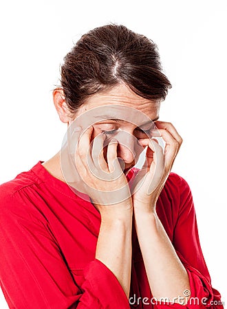 Sleepy young woman scratching her eyes for allergies Stock Photo