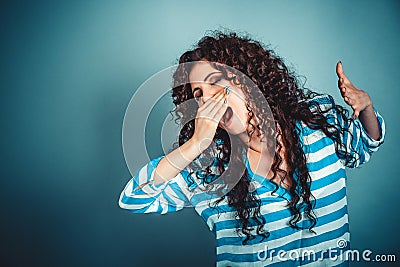 Sleepy young woman with wide open mouth yawning eyes closed look Stock Photo